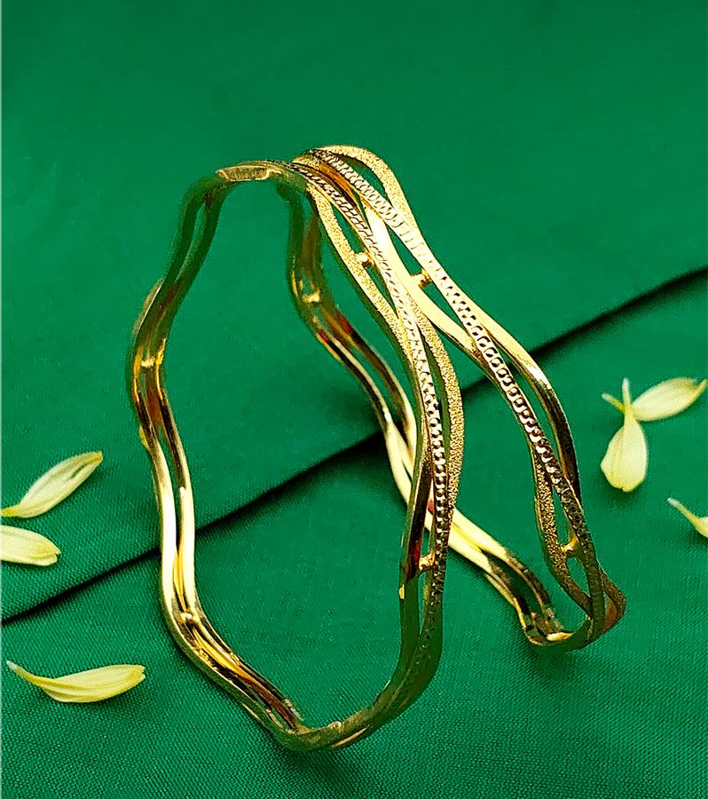Unique Copper-Based Gold Bangles with Wavy Twist Patterns