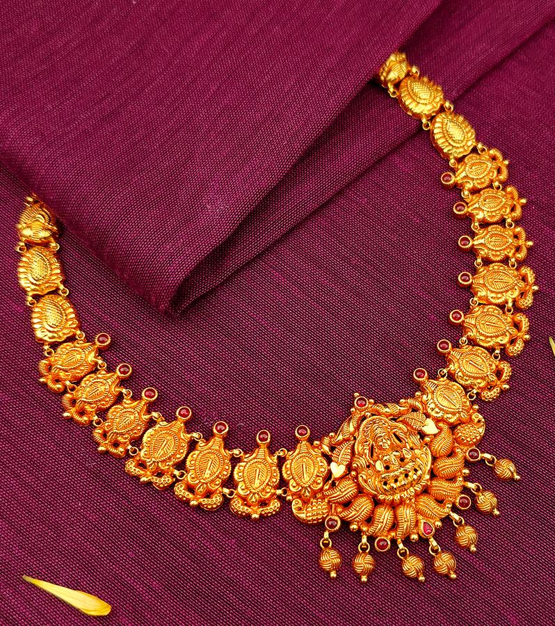 Elegant Handcrafted Gold Lakshmi Necklace